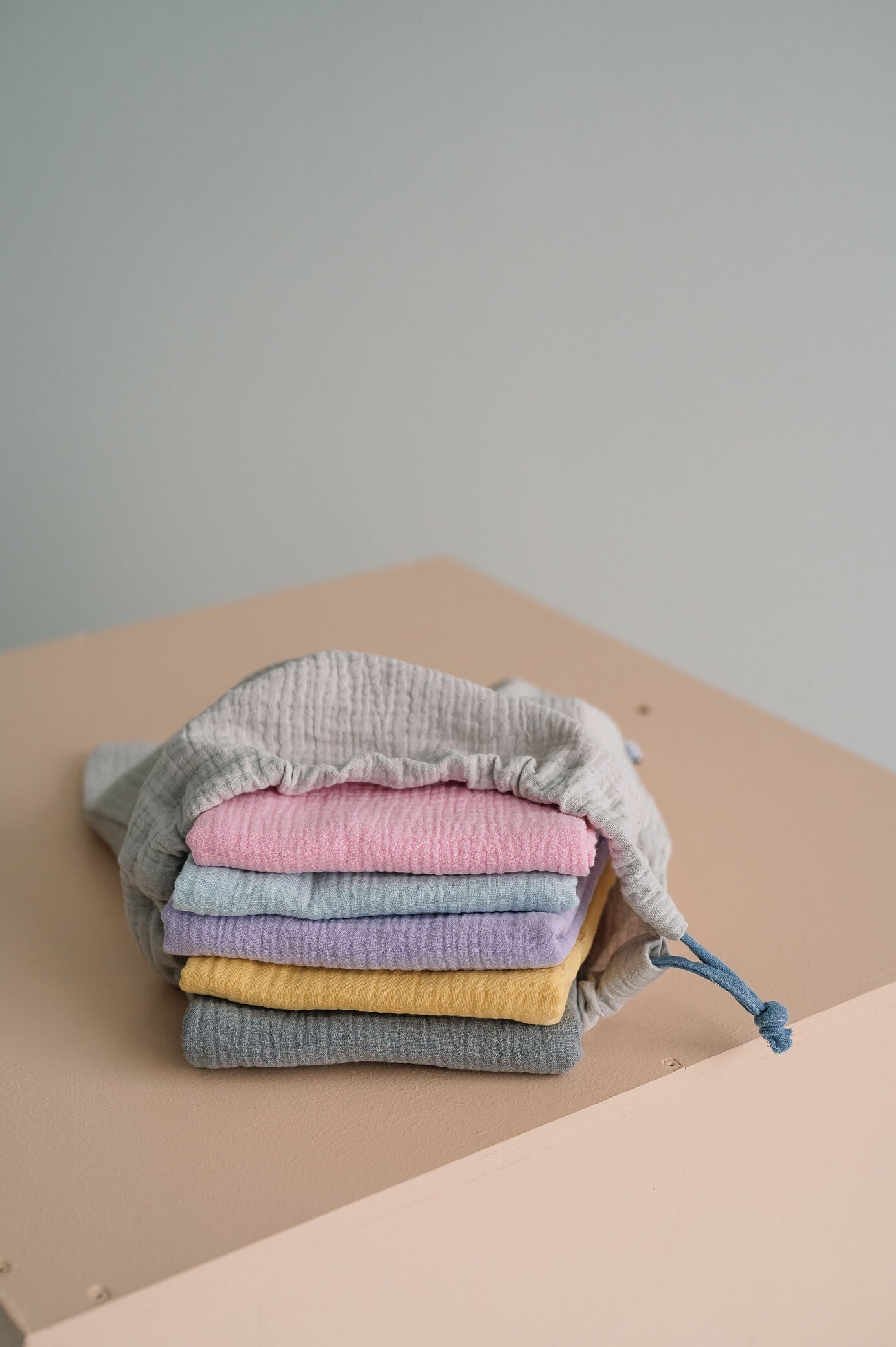 pussukka_lightbeige_harso_pink_babyblue_lightlavender_softyellow_grey.jpg