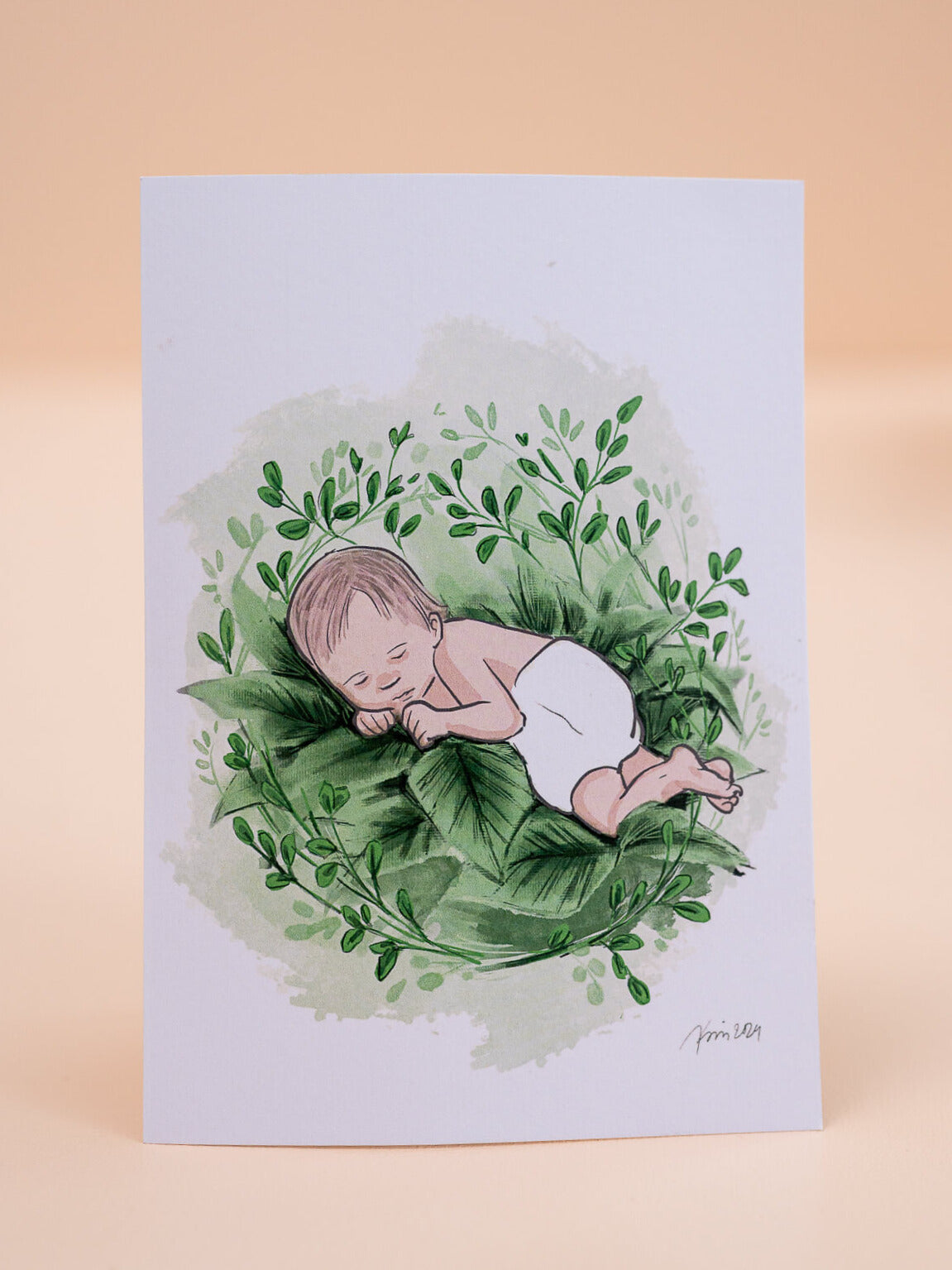 Vauva pesässä -kortti