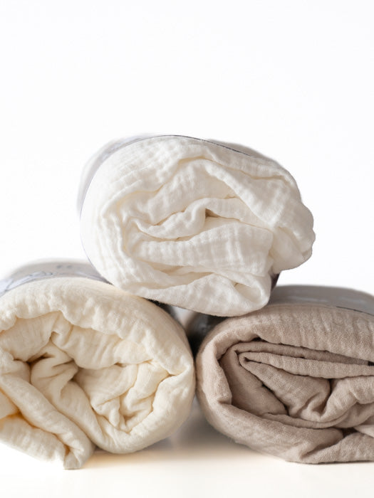 Tuotekuva_hoitoalustanpaallinen_ivory_light_beige_white