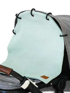 vohvelivaunu_verho_logolla__ice_blue